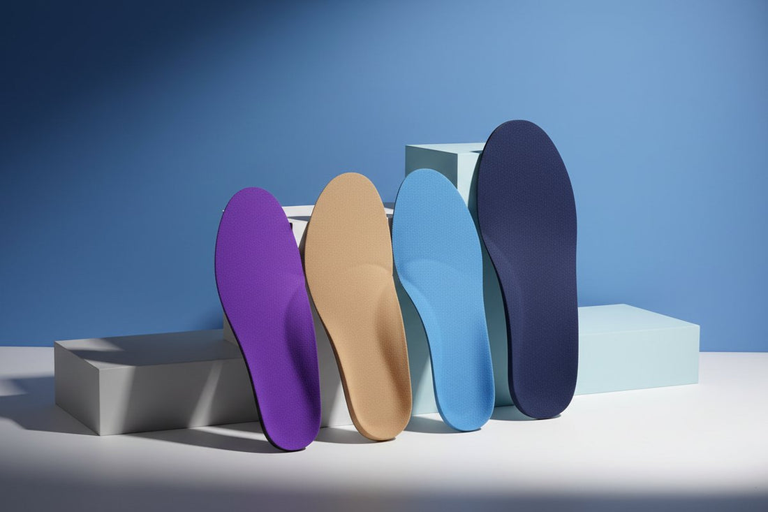 CustomTread custom orthotic insoles next to work boots showing the fit and arch support structure for occupational footwear